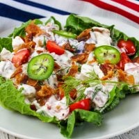Potato Salad serving on a white plate with flag patterned napkin